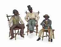 a_group_of_three_austrian_polychrome_decorated_terracotta_dandies_two_d5784972h.jpg