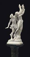 an_italian_white_marble_figural_group_of_apollo_and_daphne_on_pedestal_d5607499h.jpg