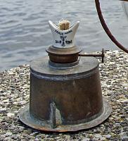 4f4813080-globe-onion-lantern-lamp-lighting-nautical-marine-maritime-burner-closeup-reg.jpg